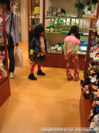 a pair of young girls at Kiddyland in Riverwalk