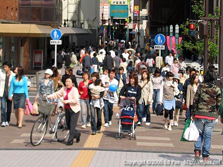 crowd waiting for the light to change