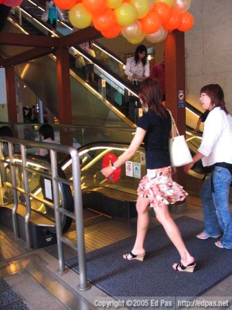 short skirt and 'oversize' shoes at Riverwalk