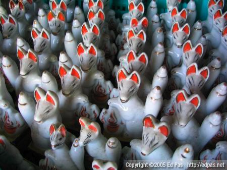 detail of foxes in altar, Sugawara Jinja grounds